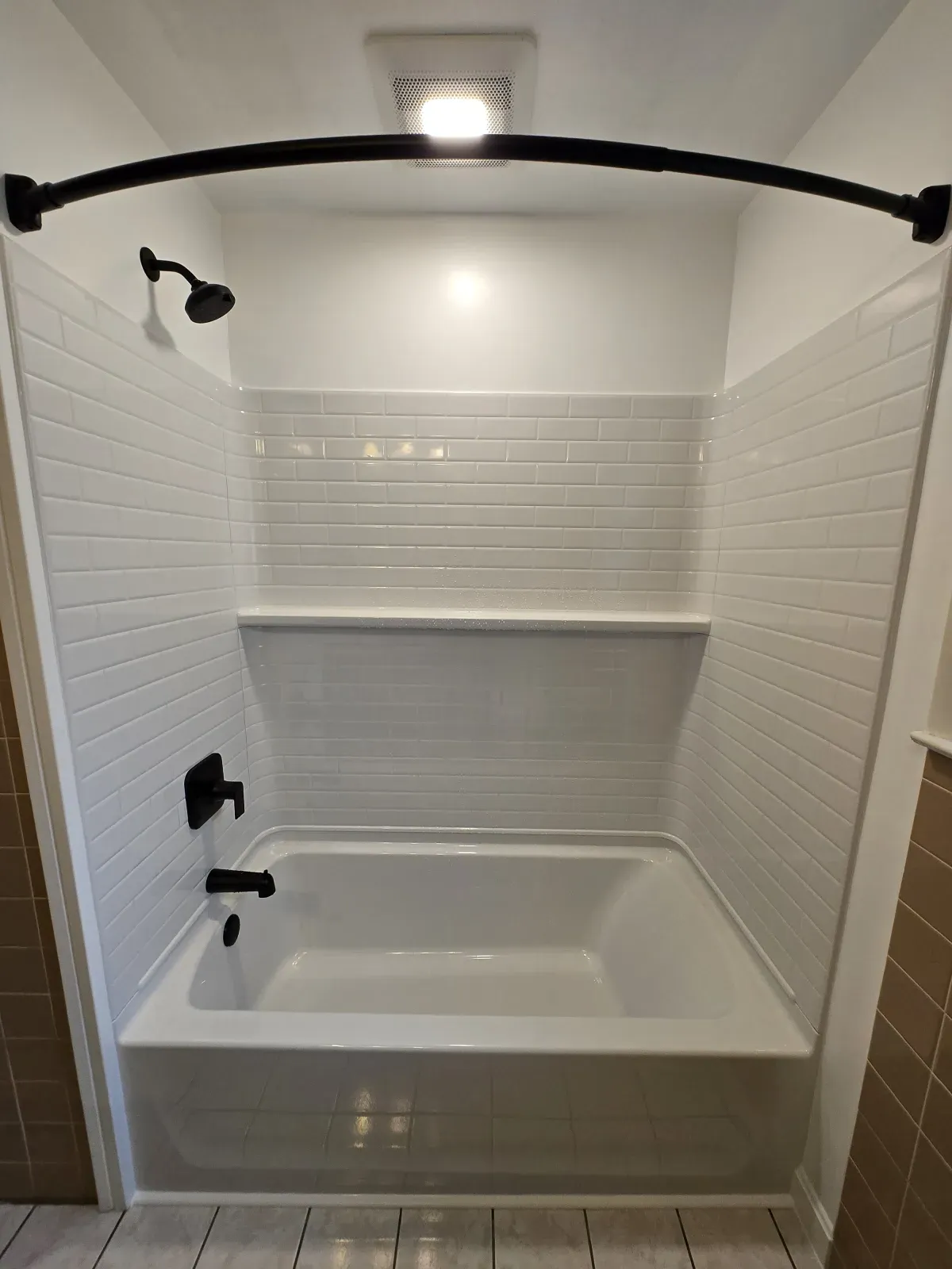 Acrylic shower enclosure with glass door